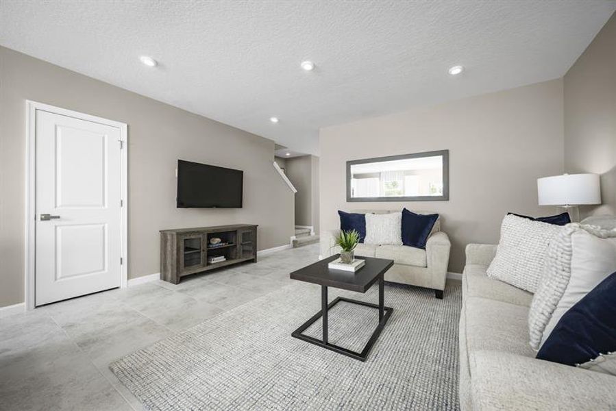 Representative furnished interior of a home built from the Piper End Unit by Ryan Homes in Terra Lago Townhomes, Indiantown (Image 7).