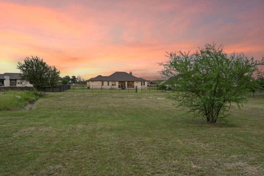 Front exterior of a new home in , Georgetown, TX, highlighting curb appeal (Image 2).