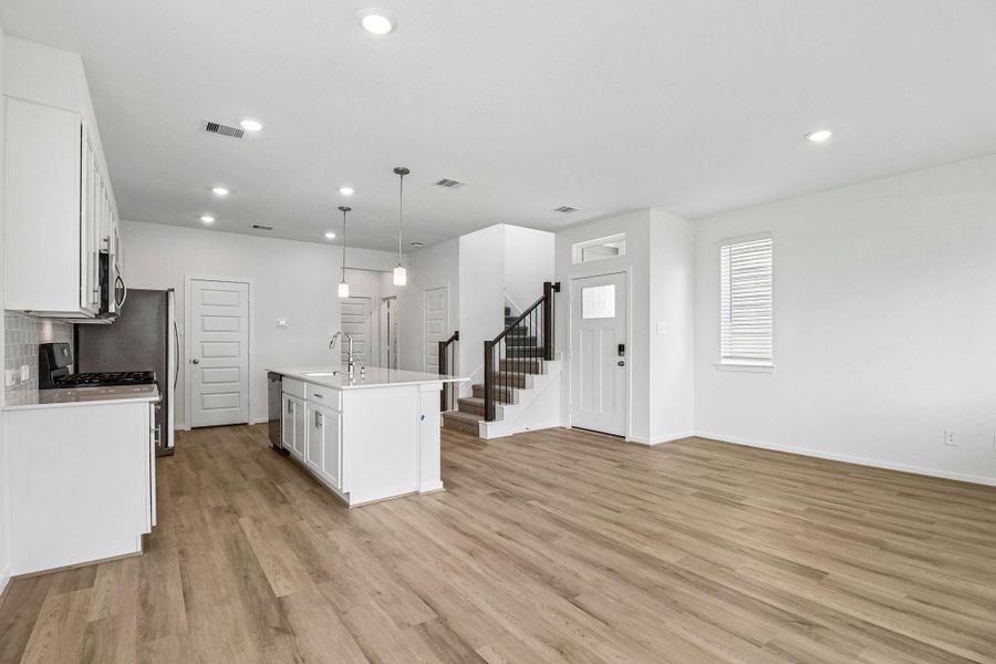 Photos are not of the actual home, but are photos of the builder home with same floorplan with similar interior finishes.