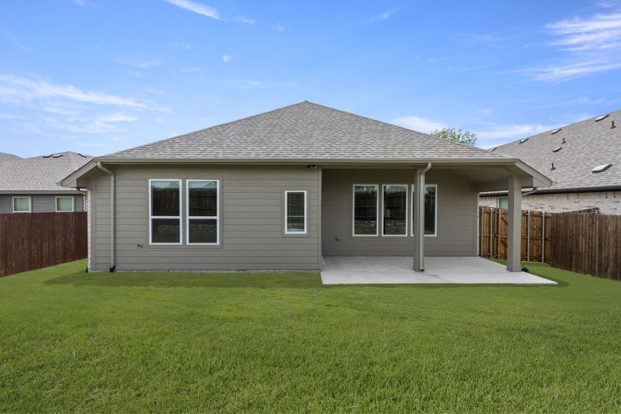 Exterior details and patio area of a home in Keeneland, Aubrey (Image 4).