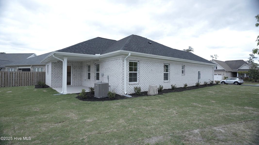 Front exterior of a new home in Palmetto Creek, Bolivia, NC, highlighting curb appeal (Image 17). Front exterior of a new home in Palmetto Creek, Bolivia, NC, highlighting curb appeal (Image 17).