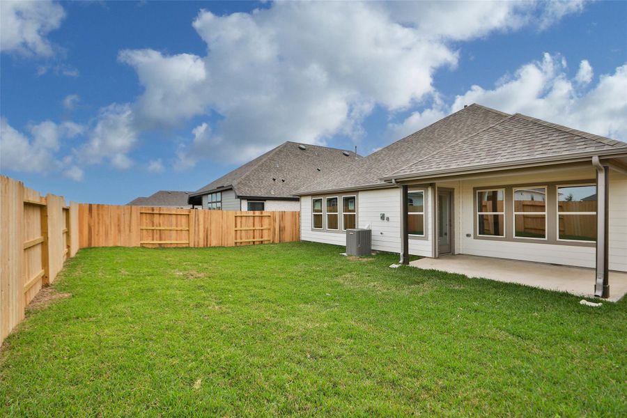 Exterior details and patio area of a home in Aldeana, Bonney (Image 22).