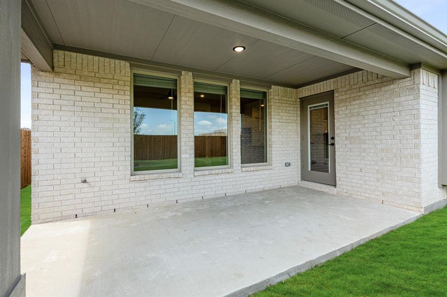 Exterior details and patio area of a home in Wildflower Ranch 60-65, Justin (Image 3). Exterior details and patio area of a home in Wildflower Ranch 60-65, Justin (Image 3).