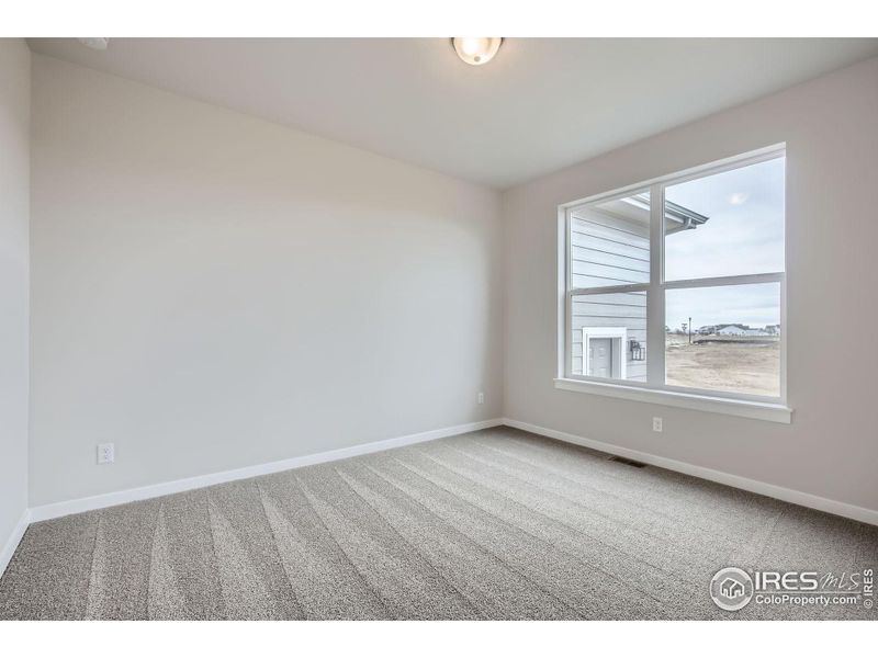 Spacious, unfurnished interior of a new home in RainDance - 60s, Windsor (Image 36).