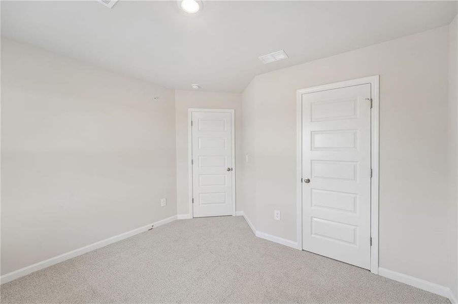 Spacious, unfurnished interior of a new home in Hemingway - Highland Series, Cumming (Image 44).