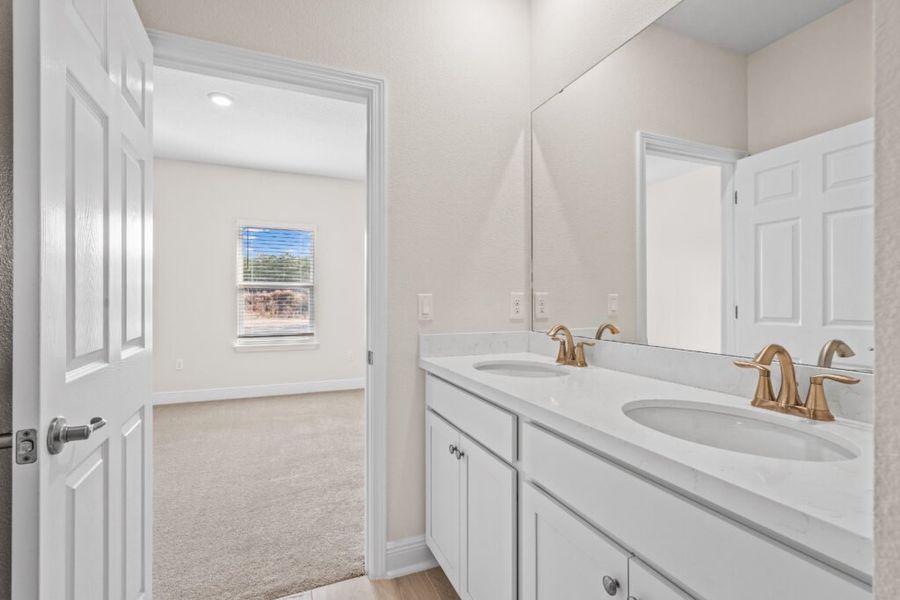 Furnished interior view inside a new home in Windswept Estates, Freeport (Image 11).