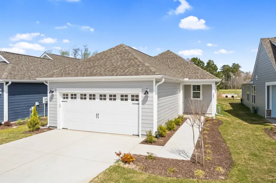 Representative exterior photo of a completed home built from the Alpine by Del Webb in Del Webb Ocean Isle Beach, Shallotte, NC (Image 21).