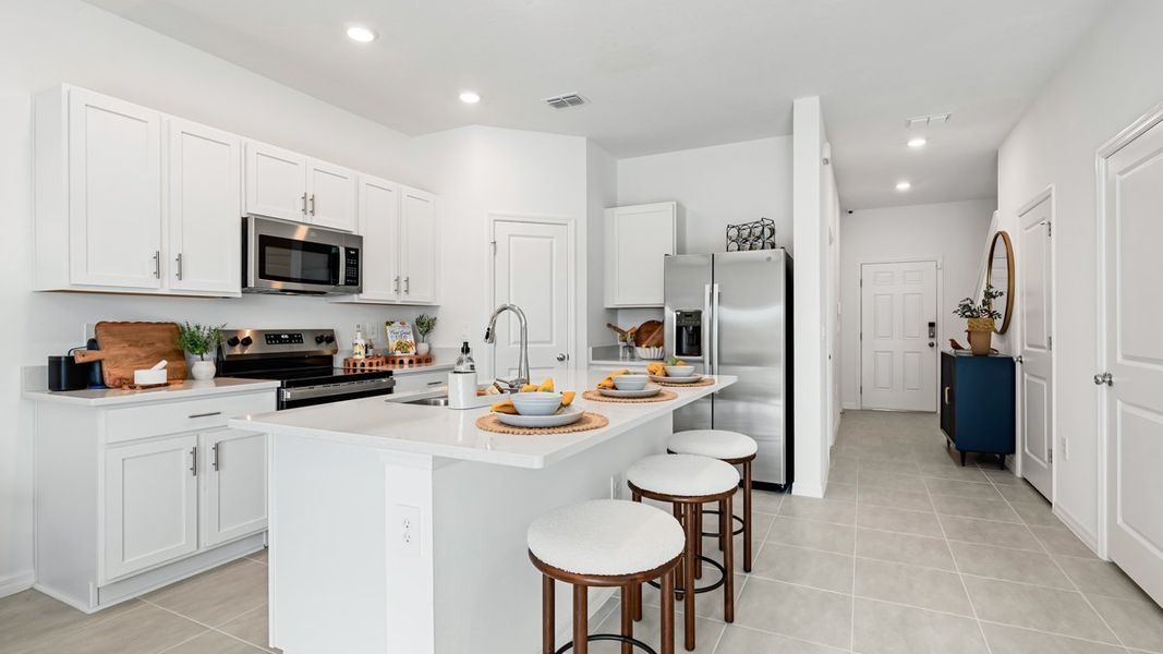 Representative furnished interior of a home built from the Marigold by Taylor Morrison in The Towns at Firethorn, Parrish (Image 5).