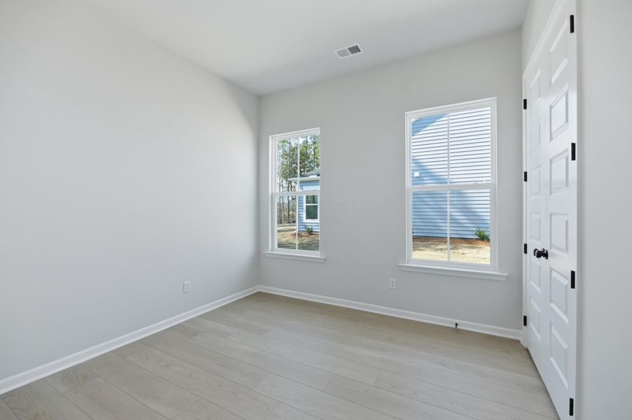 Spacious, unfurnished interior of a new home in Horizons at Summers Corner | 55+, Summerville (Image 25).