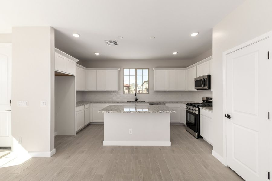 Furnished interior view inside a new home in Estrella, Goodyear (Image 3).