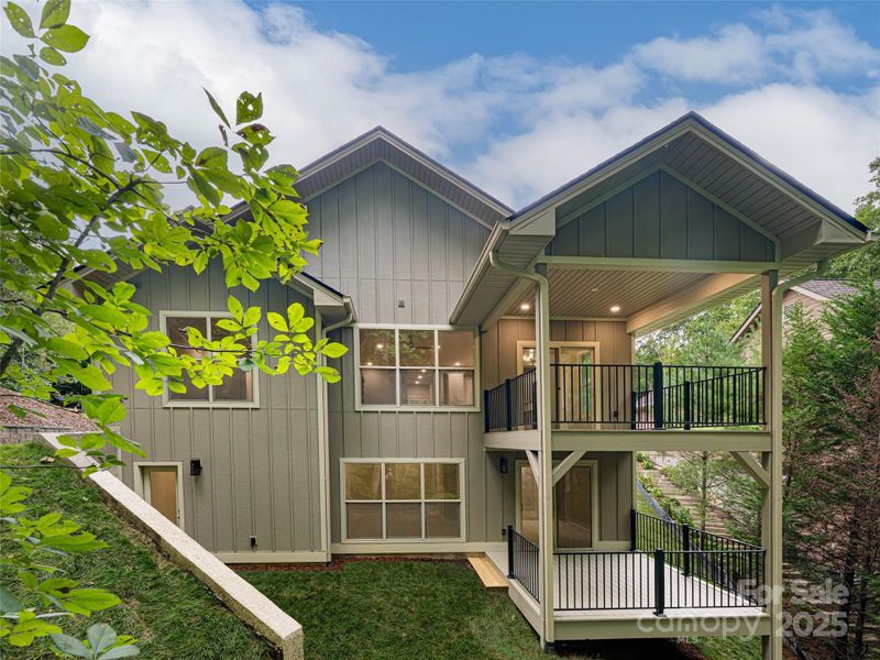 Front exterior of a new home in , Hendersonville, NC, highlighting curb appeal (Image 23).