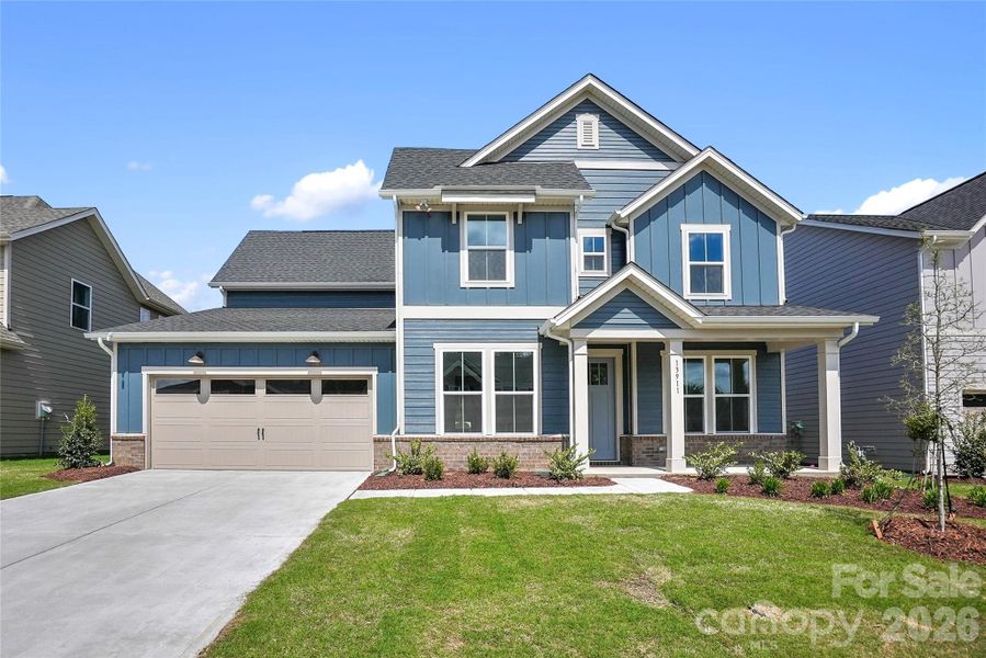 Front exterior of a new home in Parkside Crossing, Charlotte, NC, highlighting curb appeal (Image 26).