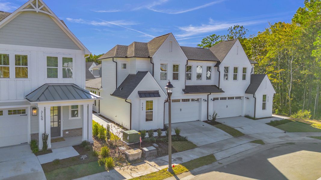 Representative exterior photo of a completed home built from the The Seagrass by RobuckHomes in East & Mason, Wilmington, NC (Image 26). Representative exterior photo of a completed home built from the The Seagrass by RobuckHomes in East & Mason, Wilmington, NC (Image 26).
