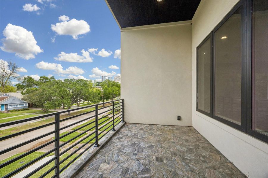 Exterior details and patio area of a home in , Houston (Image 4).