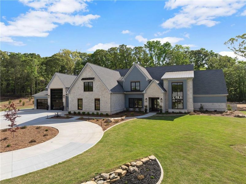 Front exterior of a new home in , Jefferson, GA, highlighting curb appeal (Image 29).