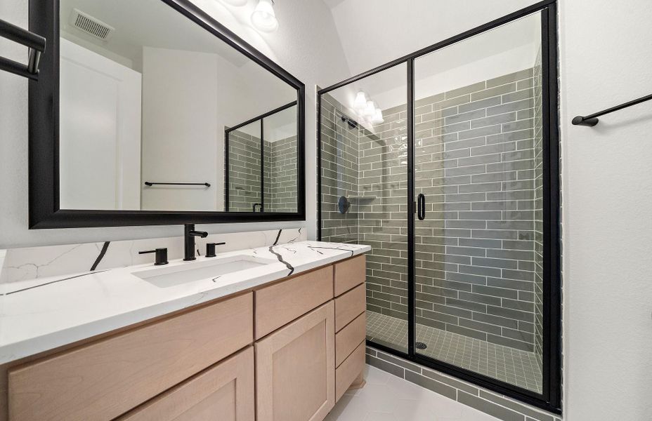 Furnished interior view inside a new home in Bridgeland 60′, Cypress (Image 12).