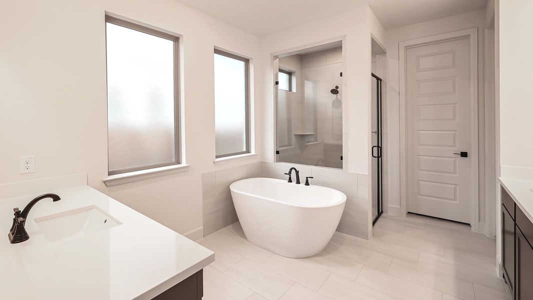 Furnished interior view inside a new home in 6 Creeks, Kyle (Image 7).