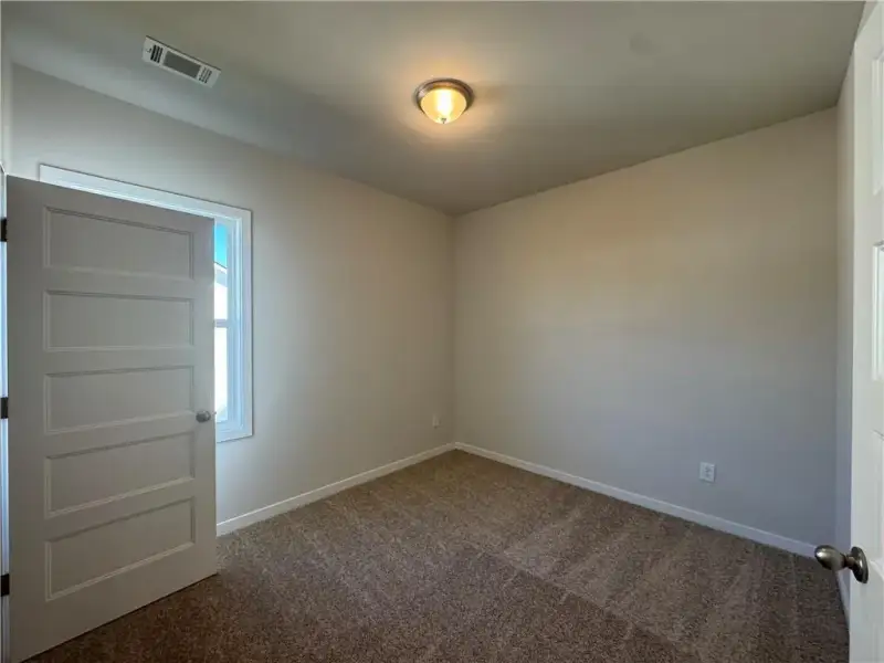 Spacious, unfurnished interior of a new home in Rosewood Lake Estates, Hoschton (Image 30).