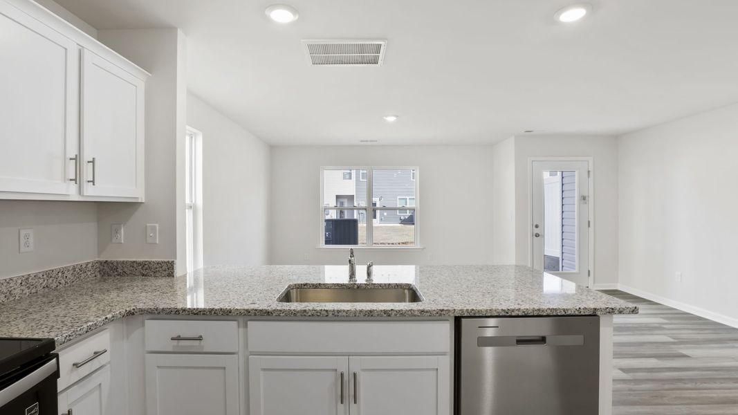 Furnished interior view inside a new home in Tanglewood Townes, Greenville (Image 5).