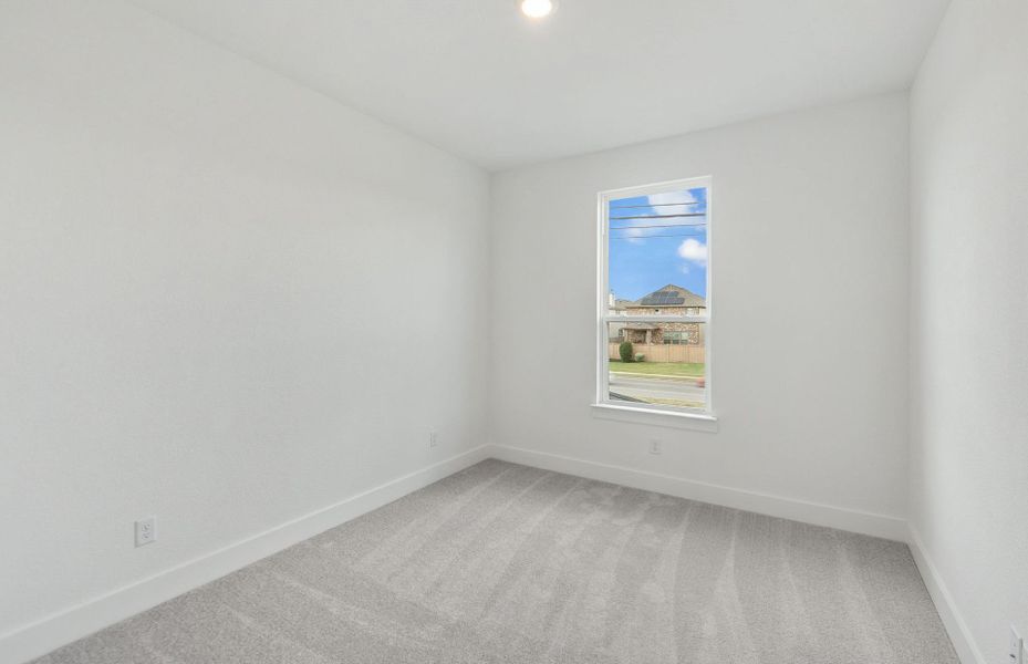 Spacious, unfurnished interior of a new home in Northpoint at Old Settlers, Round Rock (Image 15).