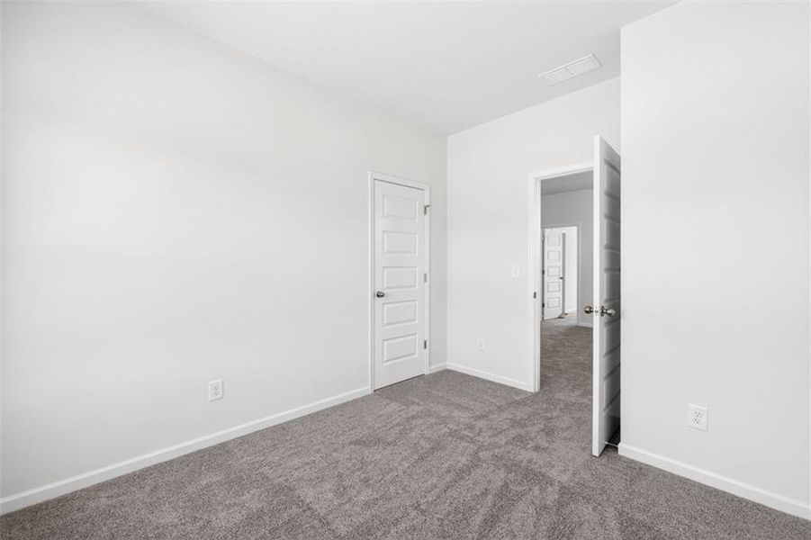 Spacious, unfurnished interior of a new home in Fuller Station, Loganville (Image 29). Spacious, unfurnished interior of a new home in Fuller Station, Loganville (Image 29).