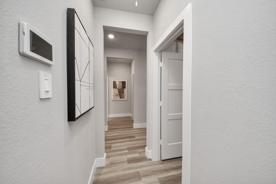 Spacious, unfurnished interior of a new home in Sunterra: Landmark Collection, Katy (Image 19).