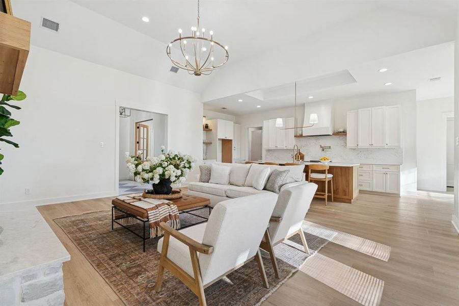 Another peek at the foyer, the beautiful French doors to the office, and the ceiling details that lend interest and character to these spaces.