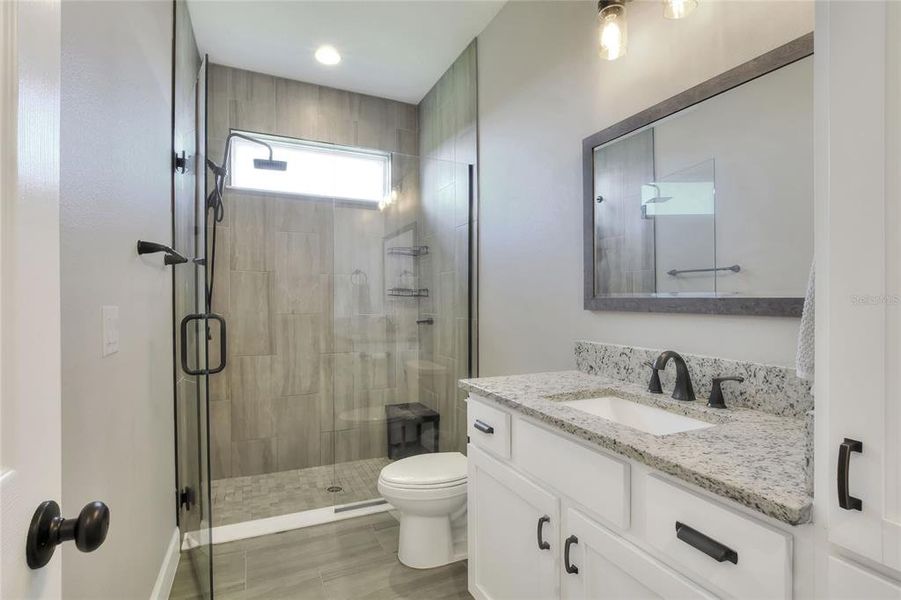 Shared Bathroom, with walk-in shower.