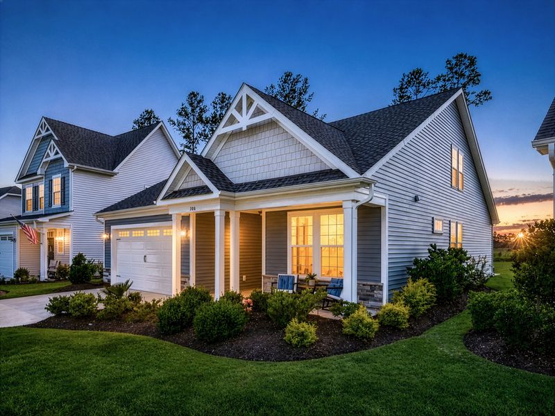 Representative exterior photo of a completed home built from the The Cherry Grove by Chesapeake Homes in Heritage Park at Longs, Longs, SC (Image 25).