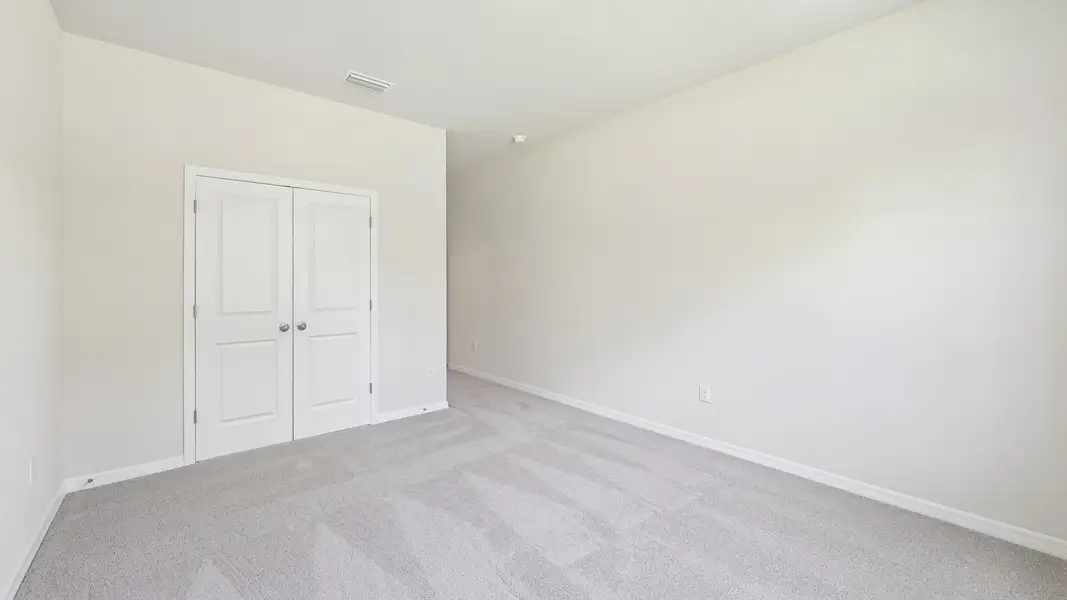 Representative unfurnished interior of a home built from the Torino by D.R. Horton in Legacy Preserve, Parrish (Image 33).