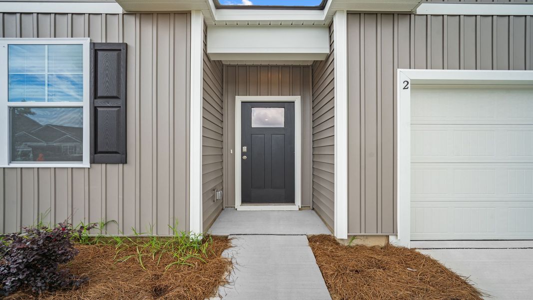 Exterior details and patio area of a home in The Groves at Bees Creek, Ridgeland (Image 3). Exterior details and patio area of a home in The Groves at Bees Creek, Ridgeland (Image 3).