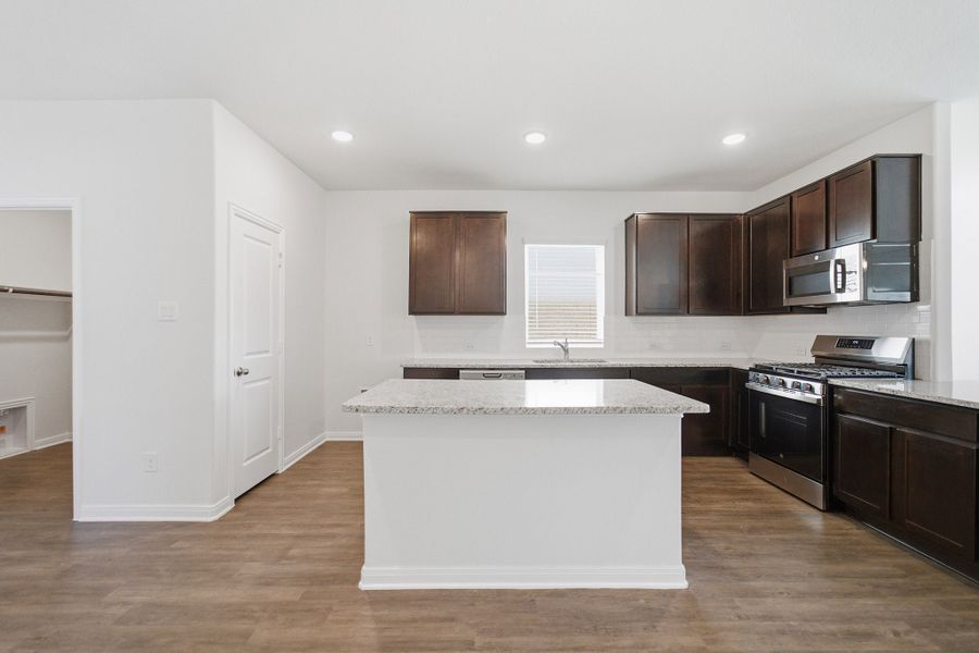 Furnished interior view inside a new home in La Terra, Celina (Image 32).