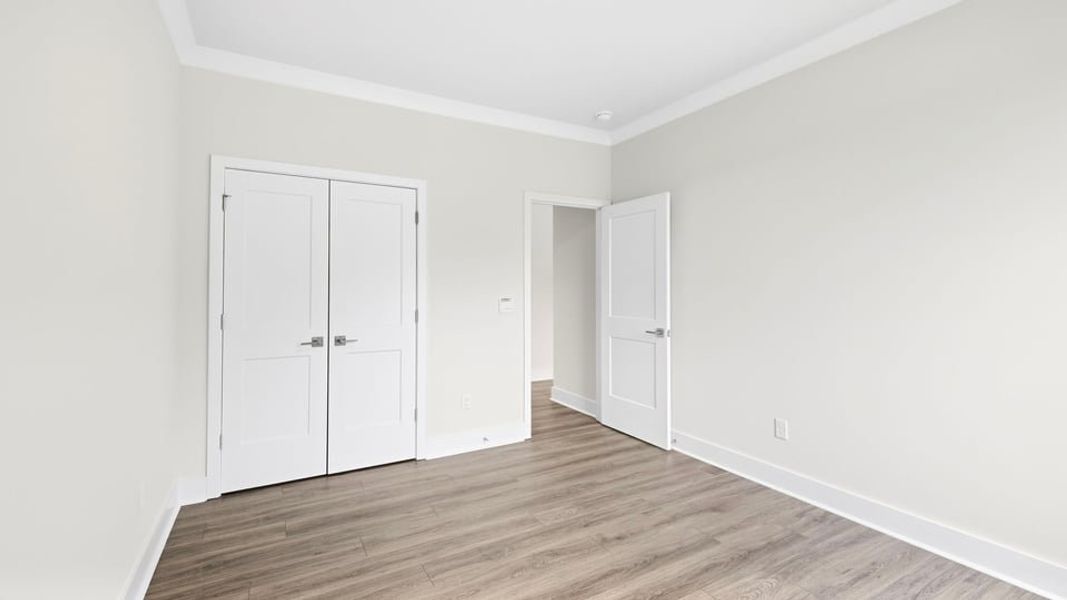 Spacious, unfurnished interior of a new home in Adams Glen, Greenville (Image 29).
