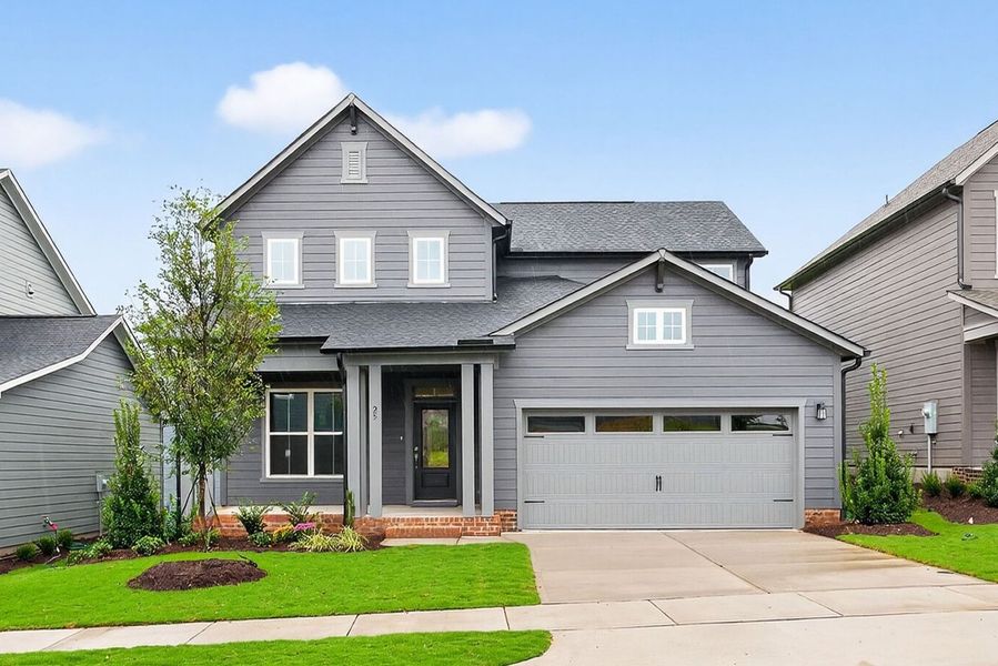 Representative exterior photo of a completed home built from the The Jasper by David Weekley Homes in Serenity - The Village Collection, Fuquay Varina, NC (Image 1).