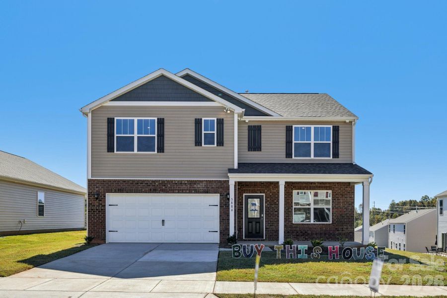 Front exterior of a new home in Cline Village, Conover, NC, highlighting curb appeal (Image 1). Front exterior of a new home in Cline Village, Conover, NC, highlighting curb appeal (Image 1).