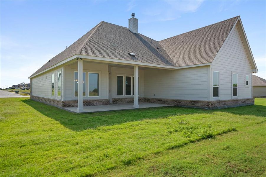 Front exterior of a new home in Fairview Meadows, New Fairview, TX, highlighting curb appeal (Image 19). Front exterior of a new home in Fairview Meadows, New Fairview, TX, highlighting curb appeal (Image 19).