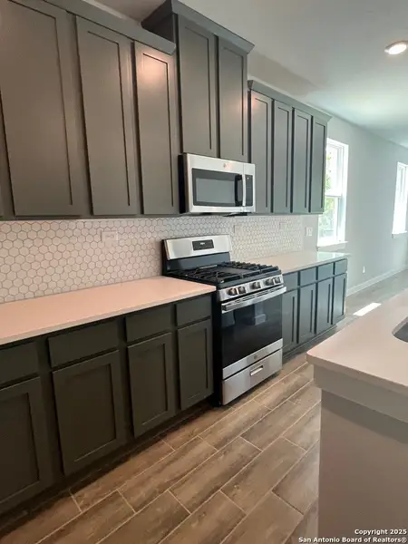 Furnished interior view inside a new home in Weston Oaks, San Antonio (Image 7).