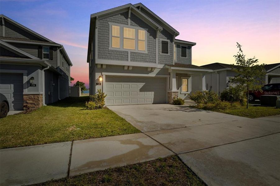 Front exterior of a new home in , Eagle Lake, FL, highlighting curb appeal (Image 20). Front exterior of a new home in , Eagle Lake, FL, highlighting curb appeal (Image 20).
