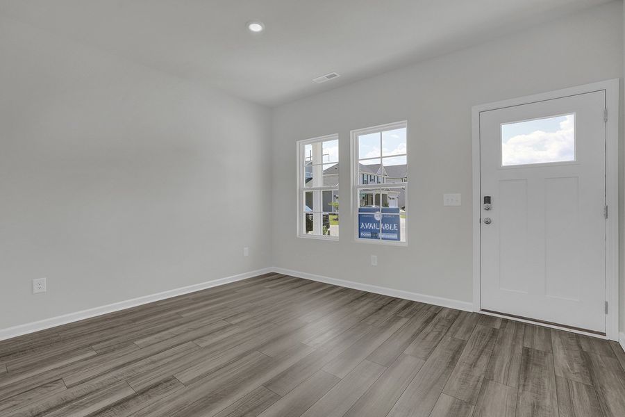 Spacious, unfurnished interior of a new home in River Tide Farms, Bolivia (Image 11).