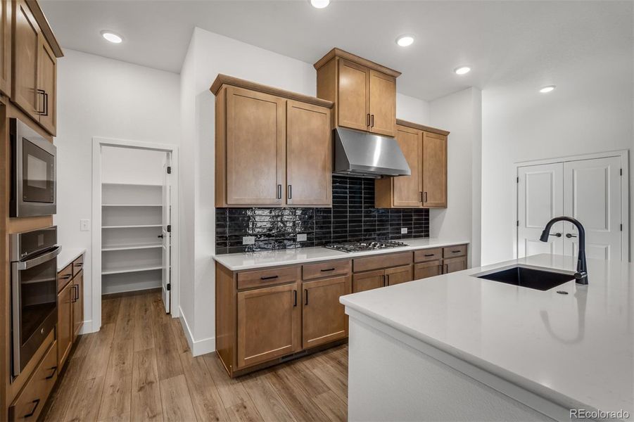 Furnished interior view inside a new home in Revel Crossing at Wolf Ranch – The Outlook Collection, Colorado Springs (Image 17).