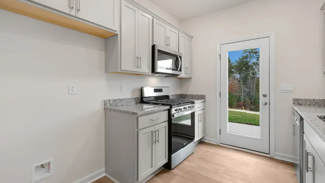 Furnished interior view inside a new home in The Townes at Galvins Ridge, Sanford (Image 7).