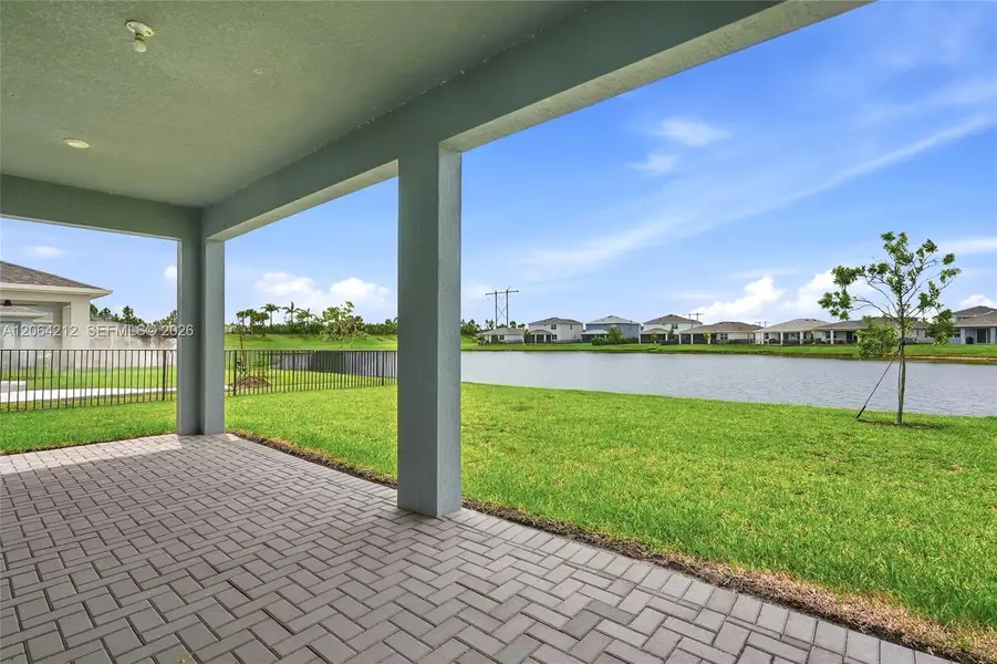 Exterior details and patio area of a home in Tradition, Port St. Lucie (Image 3).