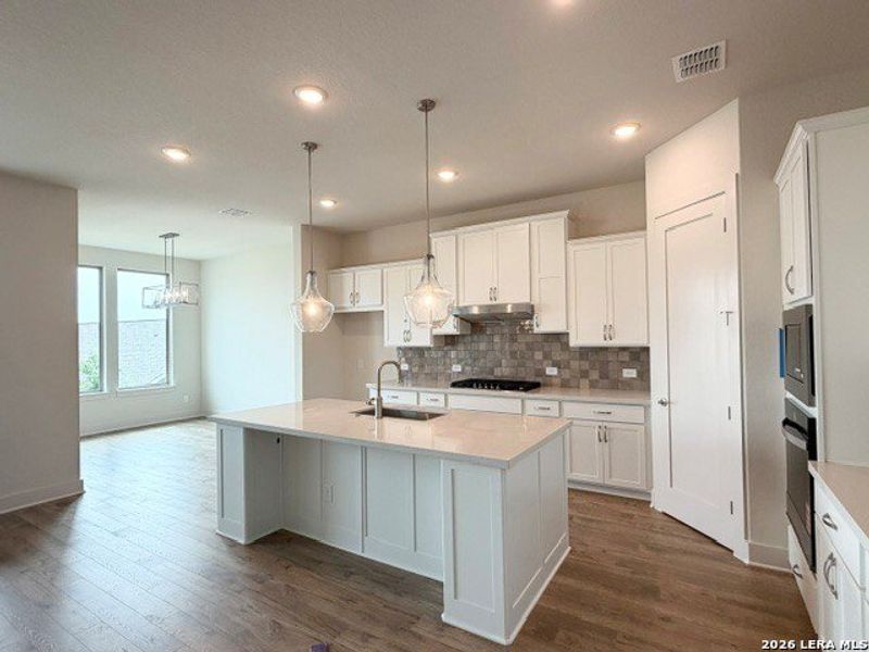 Furnished interior view inside a new home in Ladera - 50s, San Antonio (Image 5).