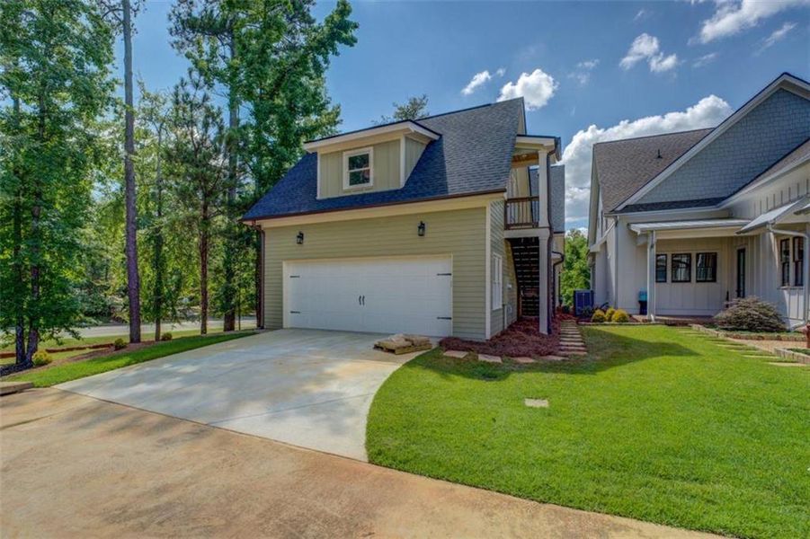 Front exterior of a new home in , Covington, GA, highlighting curb appeal (Image 28). Front exterior of a new home in , Covington, GA, highlighting curb appeal (Image 28).