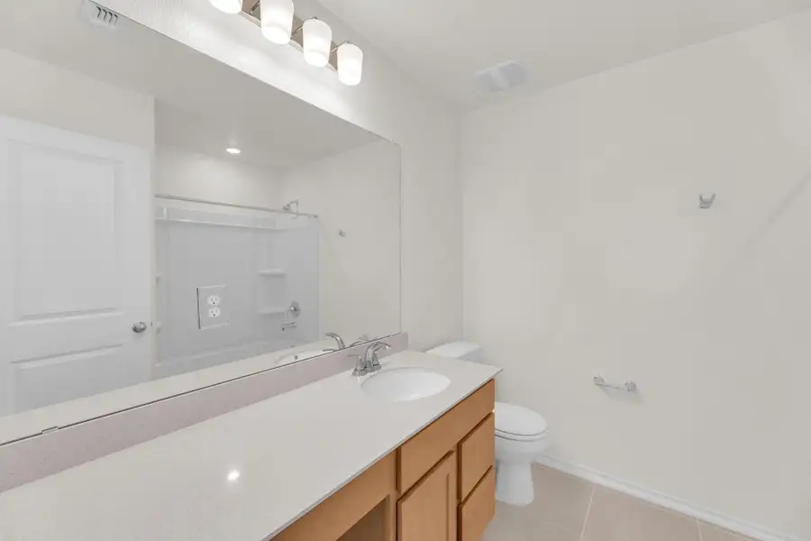 Furnished interior view inside a new home in Sonterra - Cool Water, Jarrell (Image 7).