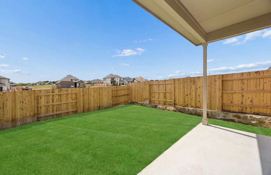 Exterior details and patio area of a home in Sunfield, Buda (Image 21).