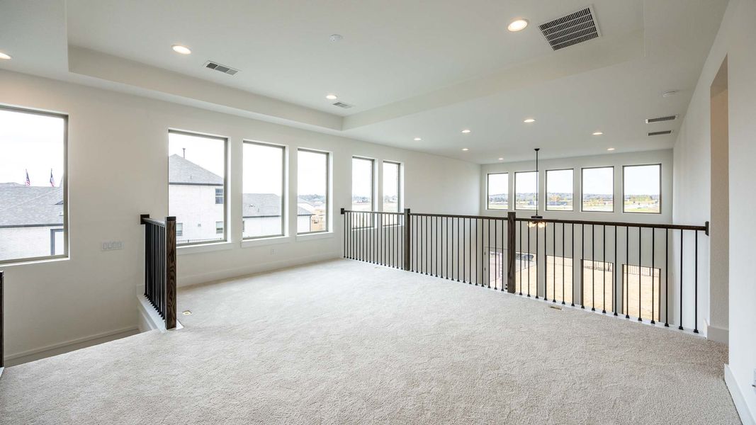 Spacious, unfurnished interior of a new home in The Colony, Bastrop (Image 11).