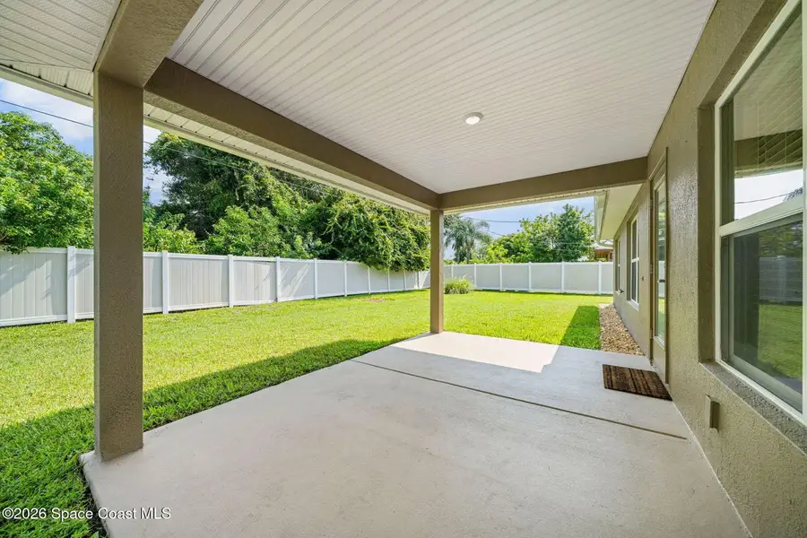 Exterior details and patio area of a home in Palm Bay, Palm Bay (Image 3).