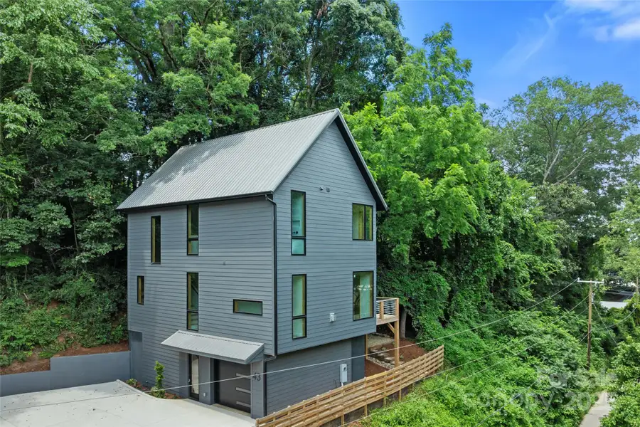 Front exterior of a new home in , Asheville, NC, highlighting curb appeal (Image 1).