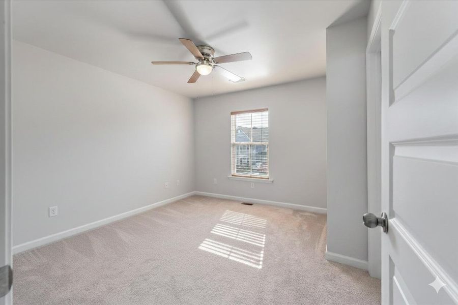Spacious, unfurnished interior of a new home in Sweetgrass at Summers Corner, Summerville (Image 23).